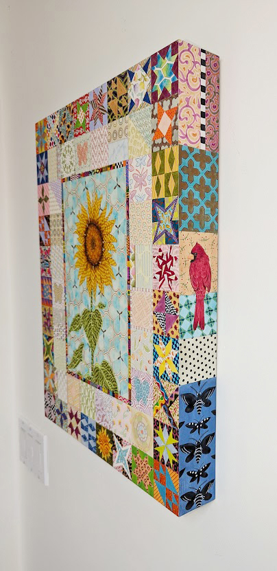 Angled view showing painted side of box painting.