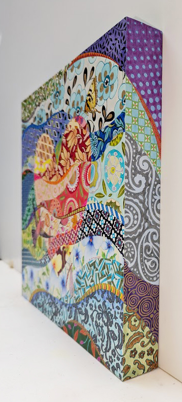 Angled view showing painted side of box painting
