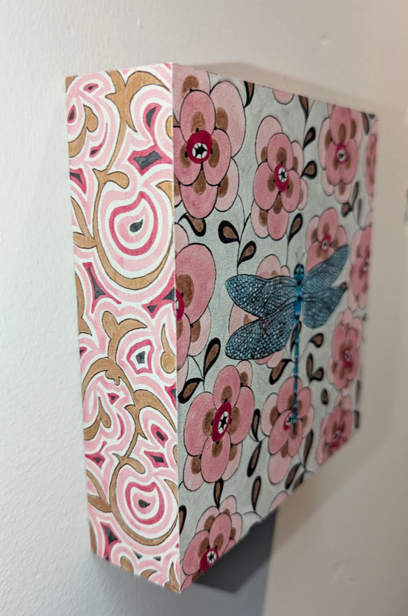 Tiny view of painting from side.