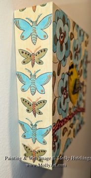 Tiny view of side of painting